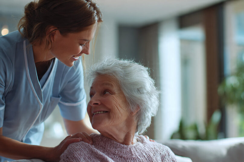 soft_warm_scene_showing_a_caregiver_gently